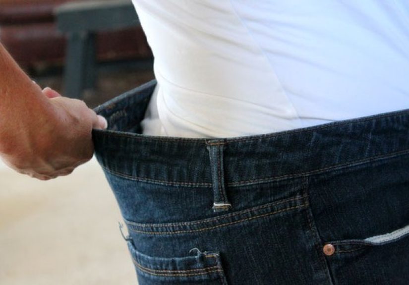 How to Take in the Waist on a Pair of Blue Jeans